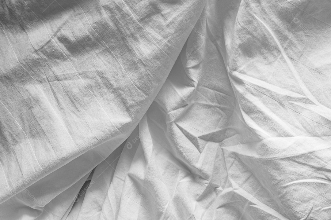 Lençóis brancos abstratos ou textura de fundo de tecido branco enrugado e textura