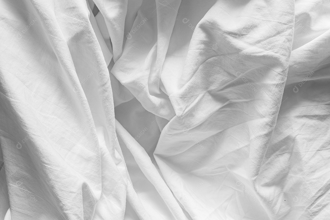 Lençóis brancos abstratos ou textura de fundo de tecido branco enrugado e textura