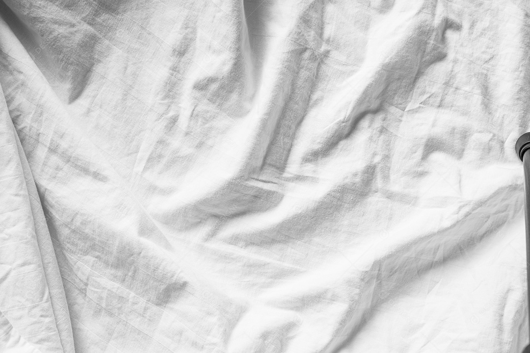 Lençóis brancos abstratos ou textura de fundo de tecido branco enrugado e textura