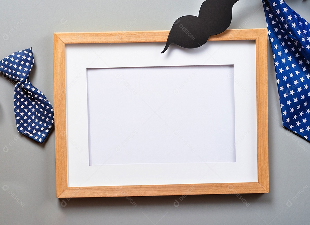 Uma moldura vazia, um bigode de papel, um botão de camisa