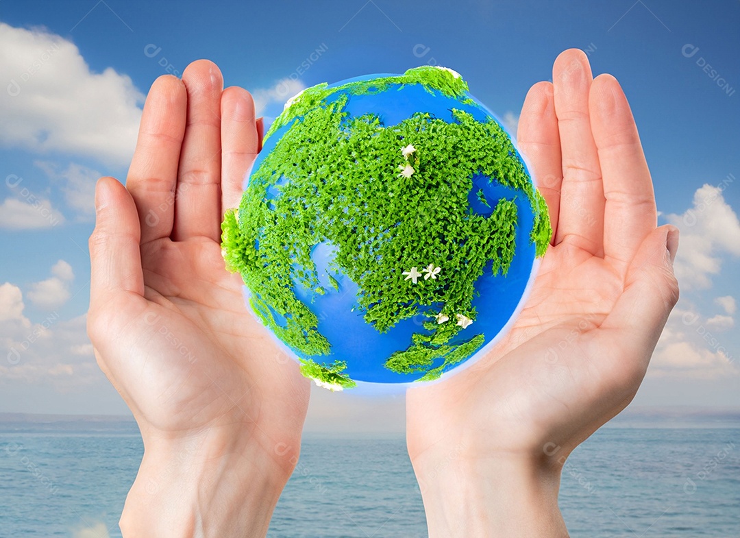 Planeta Terra nas mãos e folhas verdes