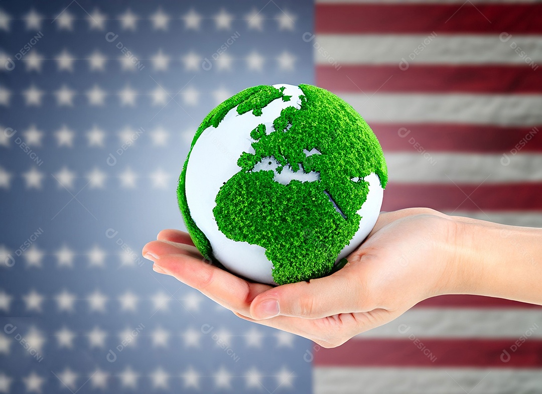 Planeta Terra nas mãos e folhas verdes