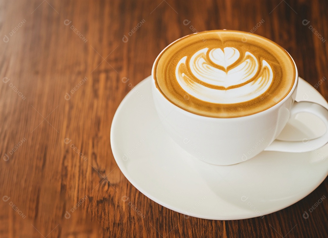 Xícara de café com leite na mesa de madeira Dia internacional do café