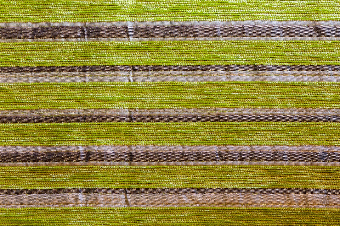Textura de estofamento listrado verde