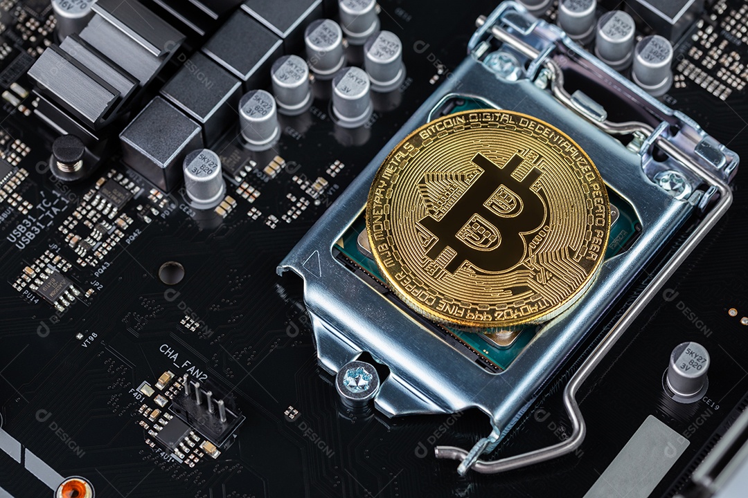 Bitcoin físico brilhante em placa eletrônica preta com foco seletivo e desfoque