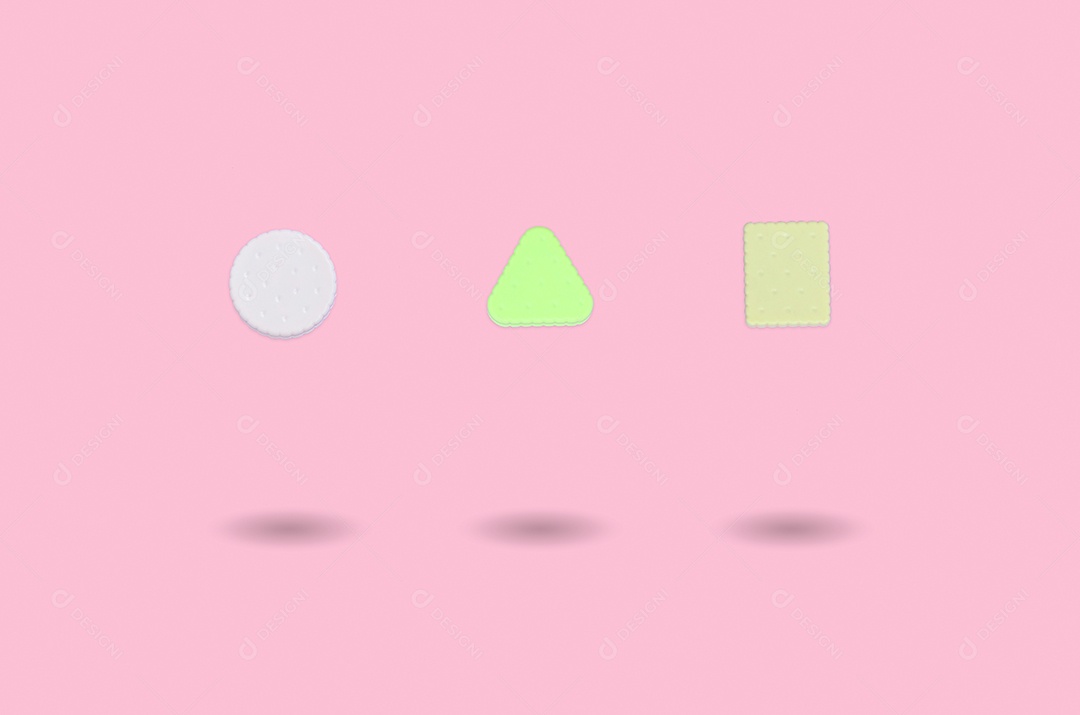 Três biscoitos voando no ar em forma de sanduíche com creme