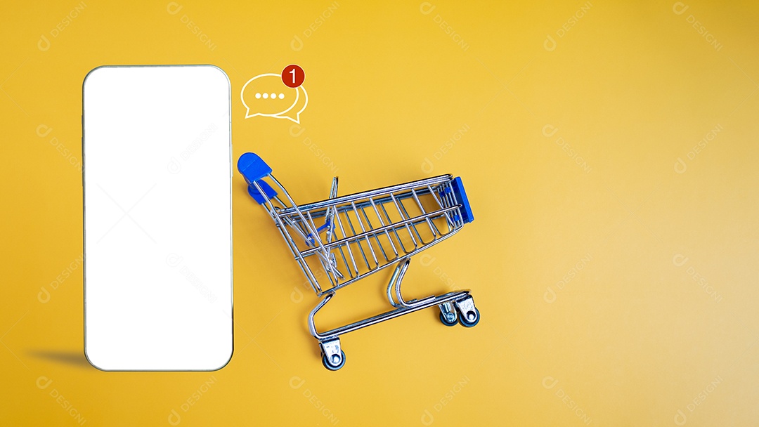 Carro de compras e smartphone vazio em fundo amarelo. conceito de compras on-line.