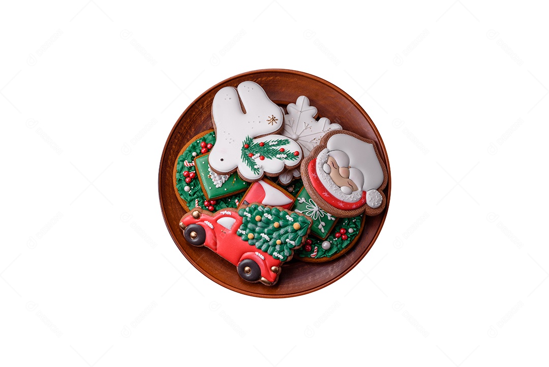 Lindo delicioso pão de gengibre de Natal em um fundo de textura de concreto. Enfeite de natal