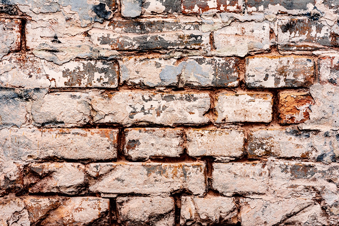Fundo velho preto e branco da textura da parede de tijolo