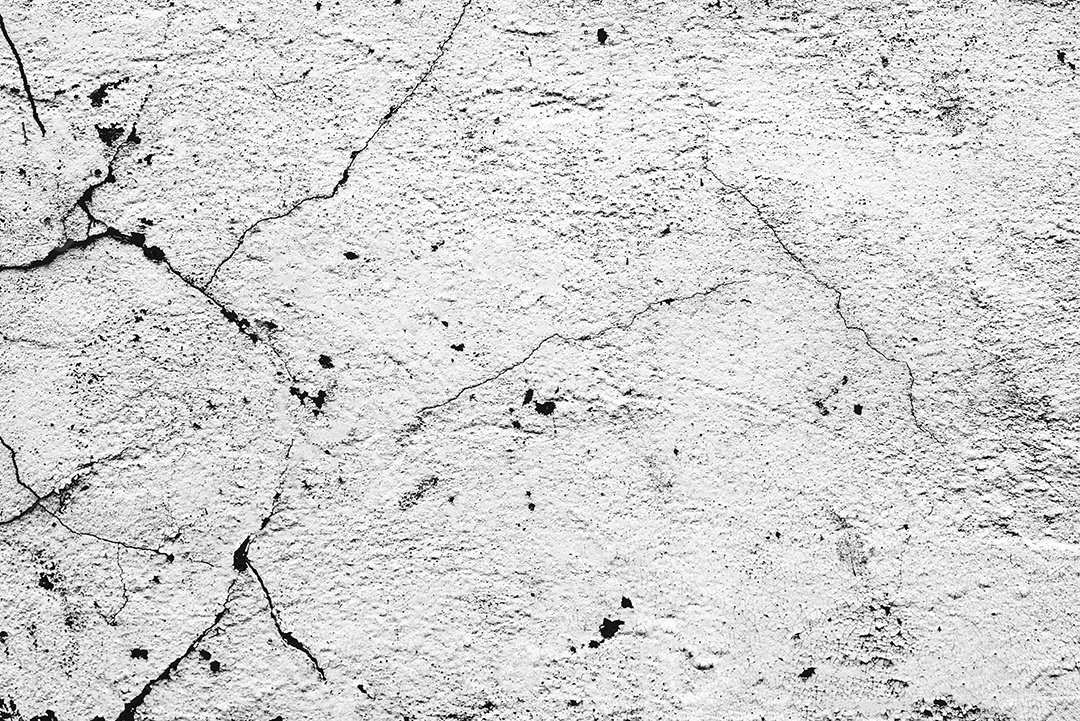 Textura, parede, concreto, pode ser usado como fundo. Fragmento de parede com arranhões e rachaduras