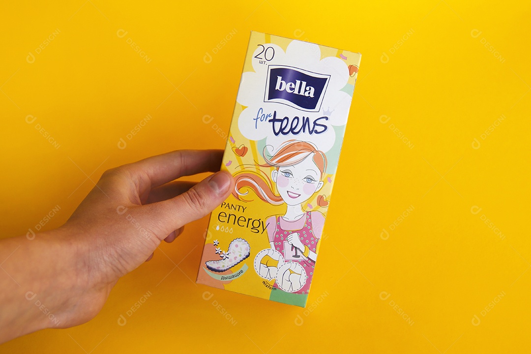 Caixa de absorventes diários Discreto em fundo amarelo