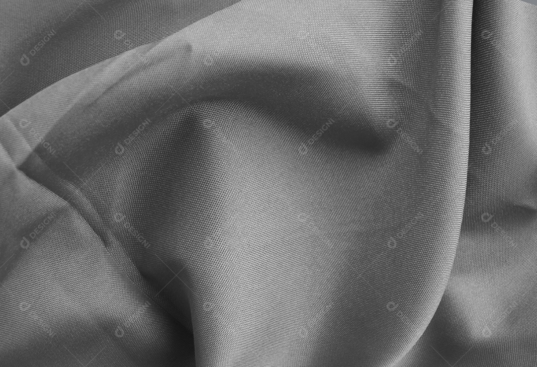 Tecido cinza com grandes dobras abstrato