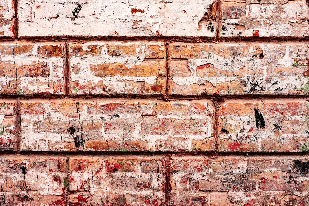 Textura, tijolo, parede, pode ser usado como fundo. Textura de tijolo com arranhões e rachaduras