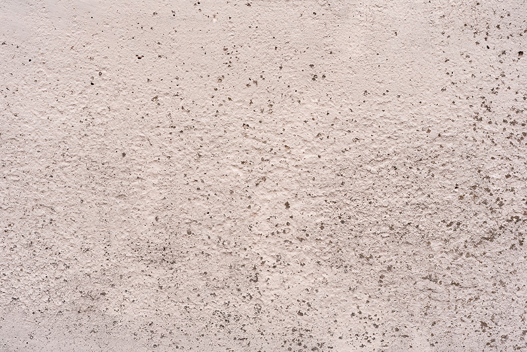 Textura, parede, concreto, pode ser usado como fundo. Fragmento de parede com arranhões e rachaduras