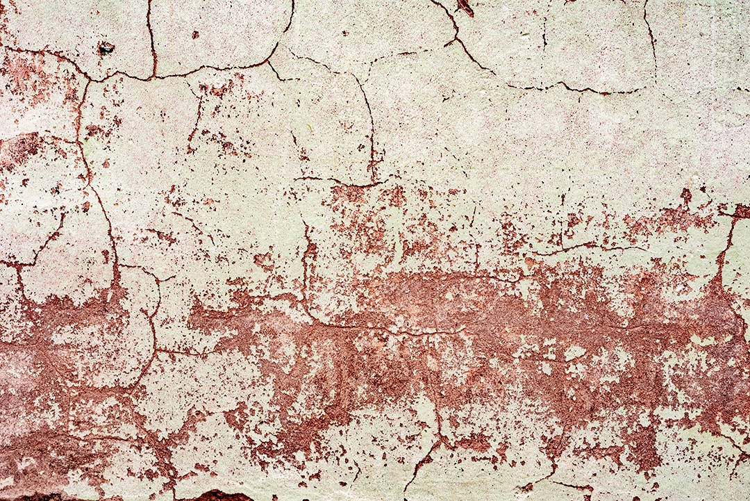 Textura, parede, concreto, pode ser usado como fundo. Fragmento de parede com arranhões e rachaduras