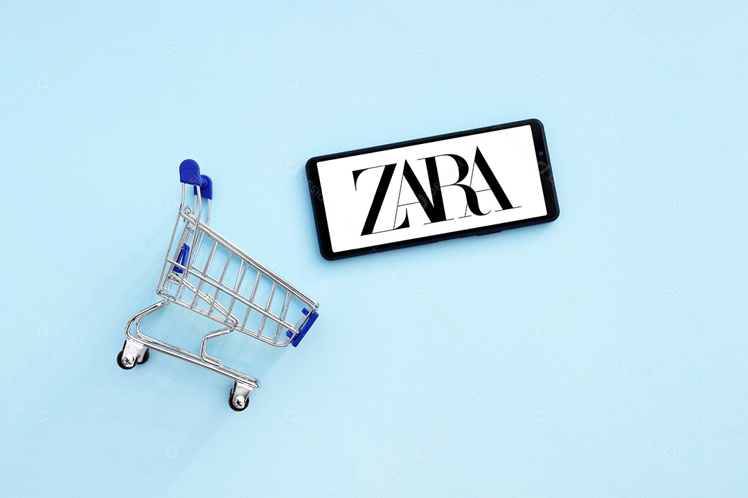 Carrinho de compras e celular indicando site da Zara