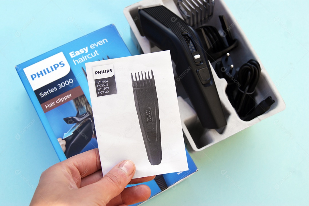 Maquina de barbear preta com pentes motorizados