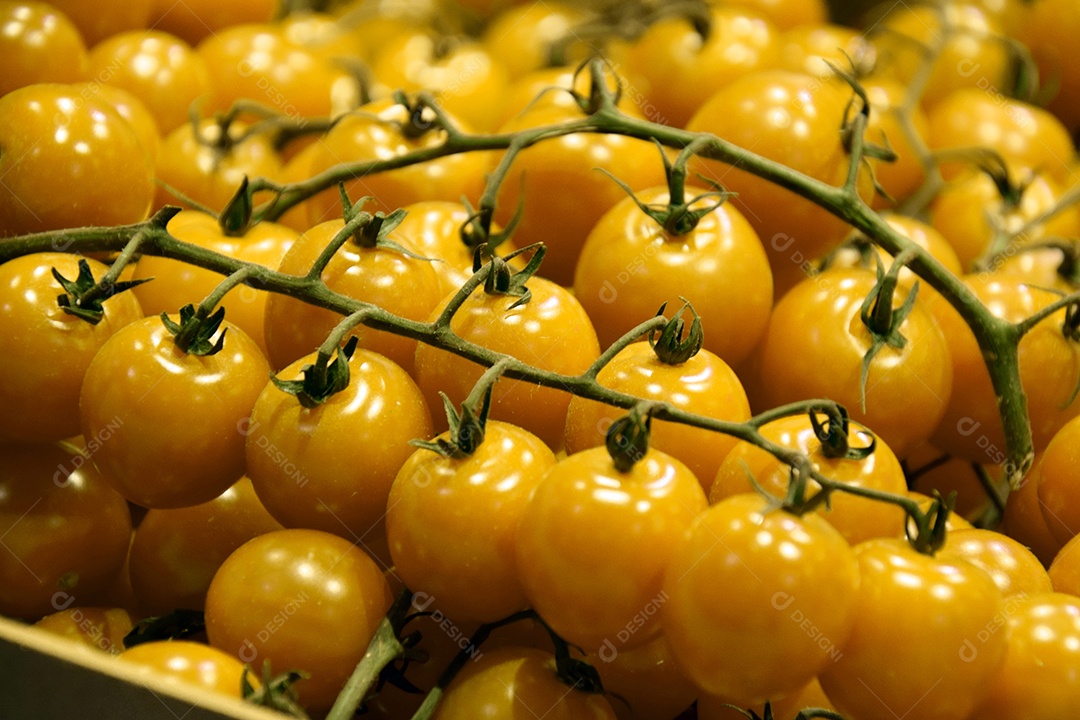 Tomates amarelos cereja