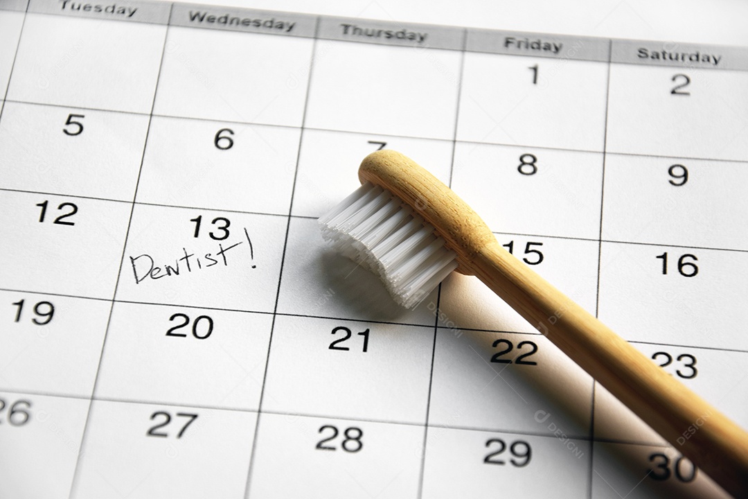 Escova e calendário  com data para dentista