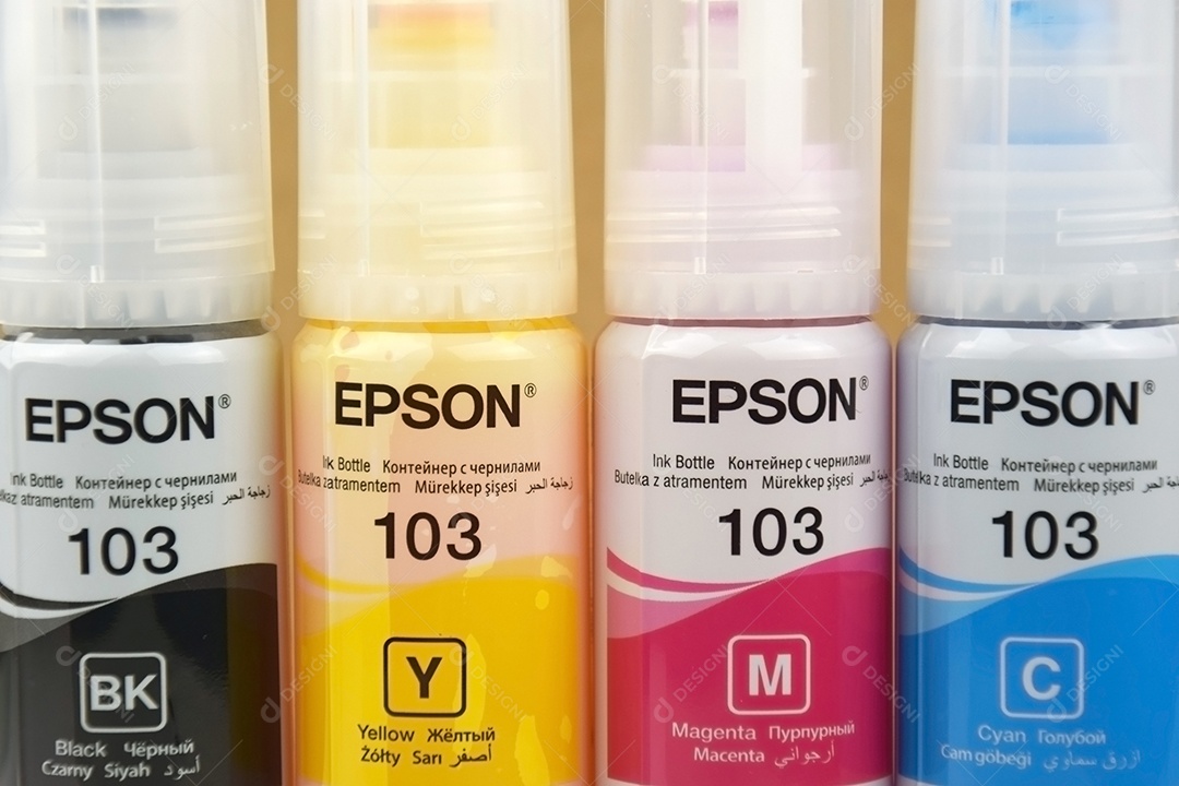 Quatro frascos de tinta Epson amarelo vermelho azul preto