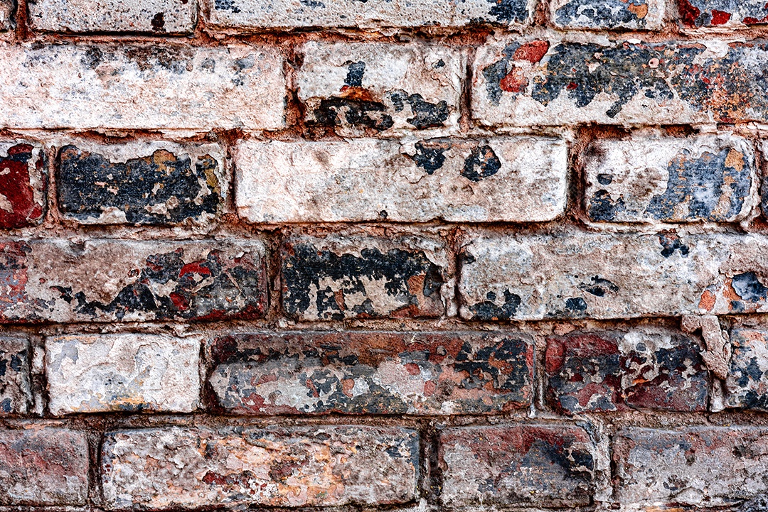 Textura, tijolo, parede, pode ser usado como fundo. Textura de tijolo com arranhões e rachaduras