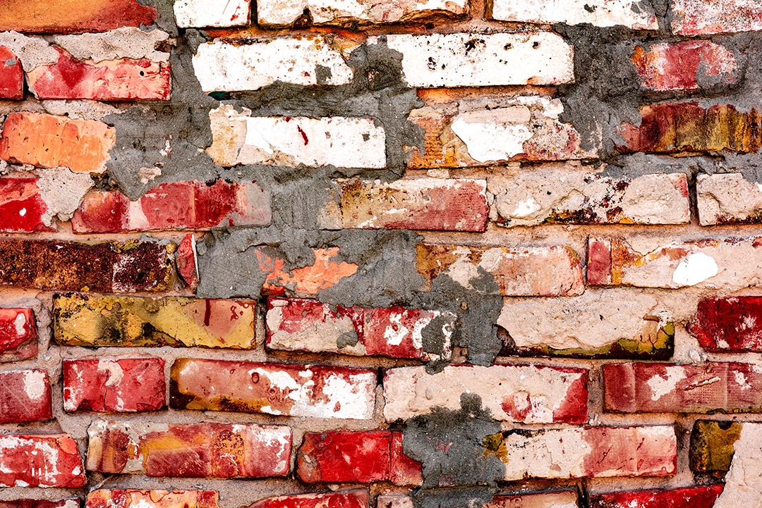 Textura, parede, concreto, pode ser usado como fundo. Fragmento de parede com arranhões e rachaduras