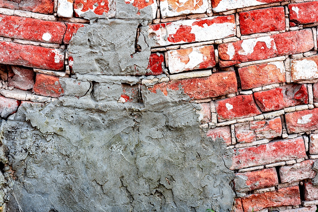 Textura, parede, concreto, pode ser usado como fundo. Fragmento de parede com arranhões e rachaduras