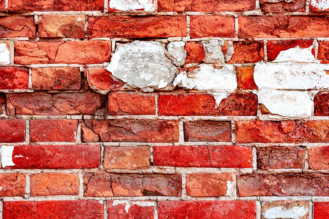 Textura, parede, concreto, pode ser usado como fundo. Fragmento de parede com arranhões e rachaduras