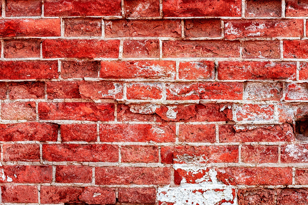 Textura, parede, concreto, pode ser usado como fundo. Fragmento de parede com arranhões e rachaduras