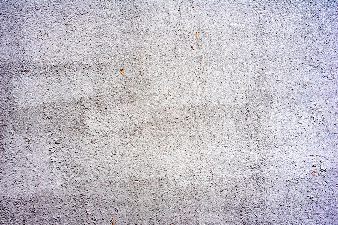 Textura de uma parede metálica com rachaduras e arranhões que podem ser usadas como fundo