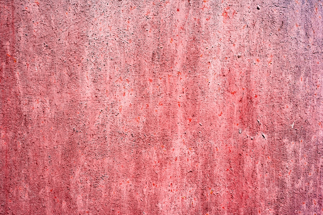 Textura de uma parede metálica com rachaduras e arranhões que podem ser usadas como fundo