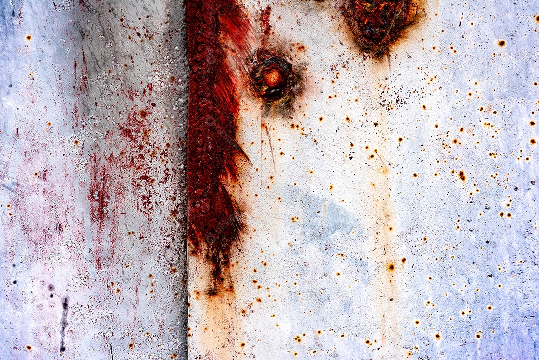 Textura de uma parede metálica com rachaduras e arranhões que podem ser usadas como fundo