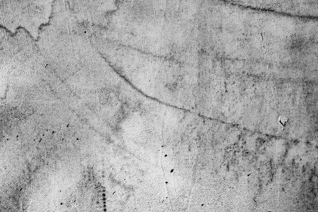 Textura, parede, concreto, pode ser usado como fundo. Fragmento de parede com arranhões e rachaduras