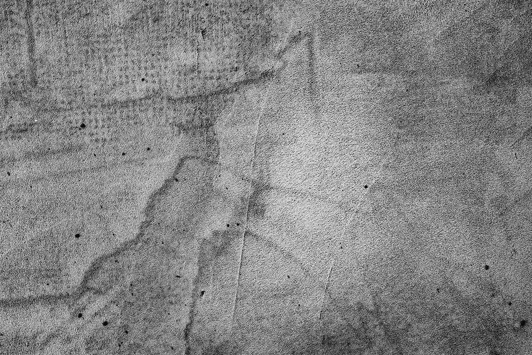 Textura, parede, concreto, pode ser usado como fundo. Fragmento de parede com arranhões e rachaduras