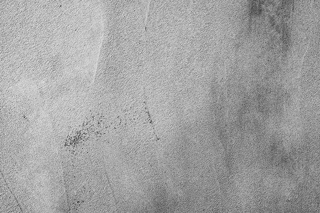 Textura, parede, concreto, pode ser usado como fundo. Fragmento de parede com arranhões e rachaduras