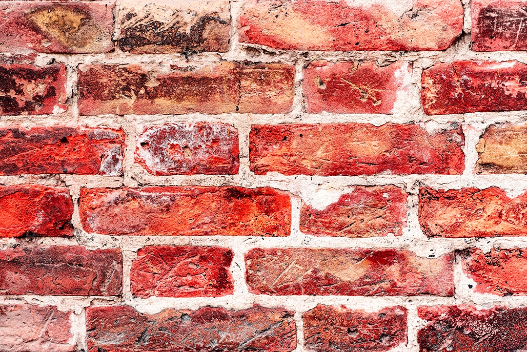 Textura, tijolo, parede, pode ser usado como fundo. Textura de tijolo com arranhões e rachaduras