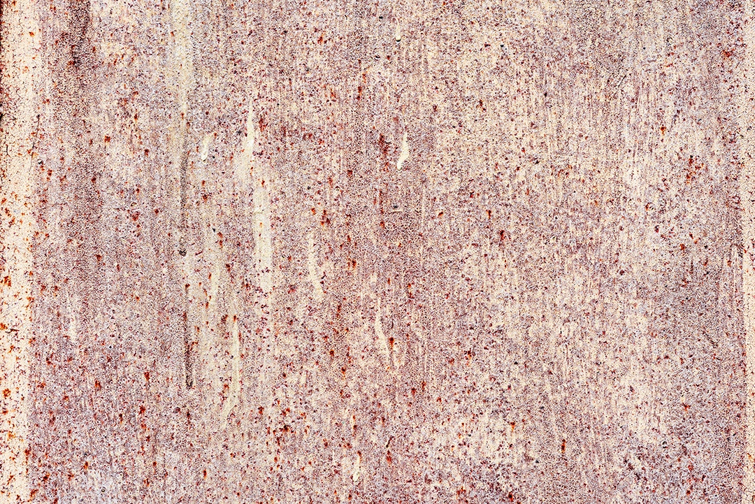 Textura de uma parede metálica com rachaduras e arranhões que podem ser usadas como fundo