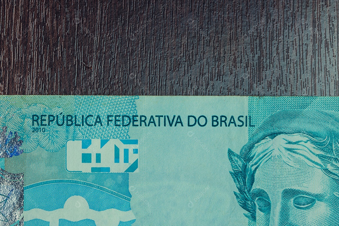 Closeup em dinheiro brasileiro de 100 notas imagem conceitual da economia do brasil