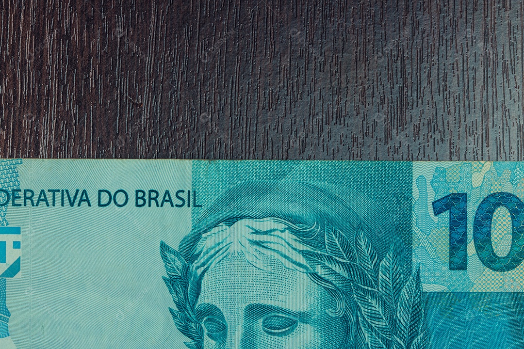 Closeup em dinheiro brasileiro de 100 notas imagem conceitual da economia do brasil