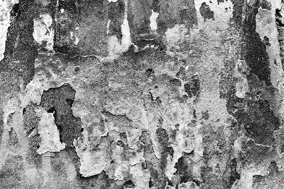 Textura de parede de uma casa com tinta desgastada