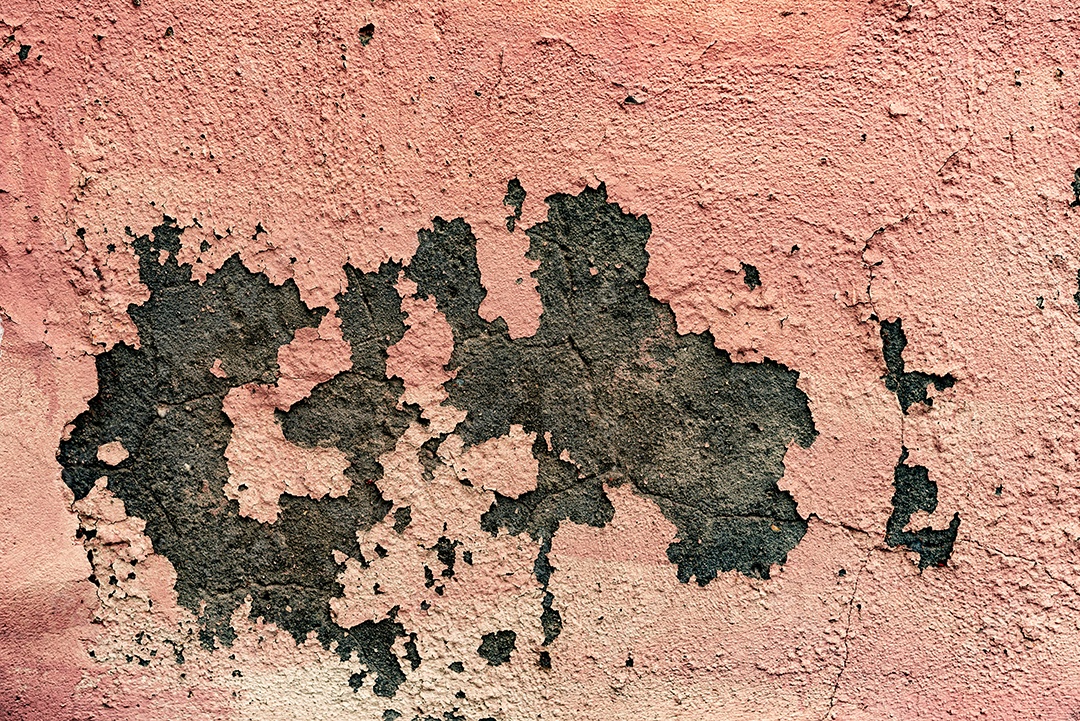 Textura, parede, concreto, pode ser usado como fundo. Fragmento de parede com arranhões e rachaduras