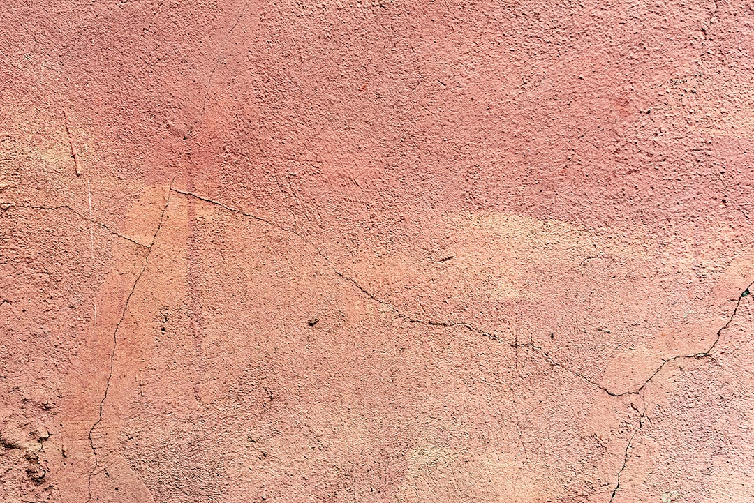 Textura, parede, concreto, pode ser usado como fundo. Fragmento de parede com arranhões e rachaduras