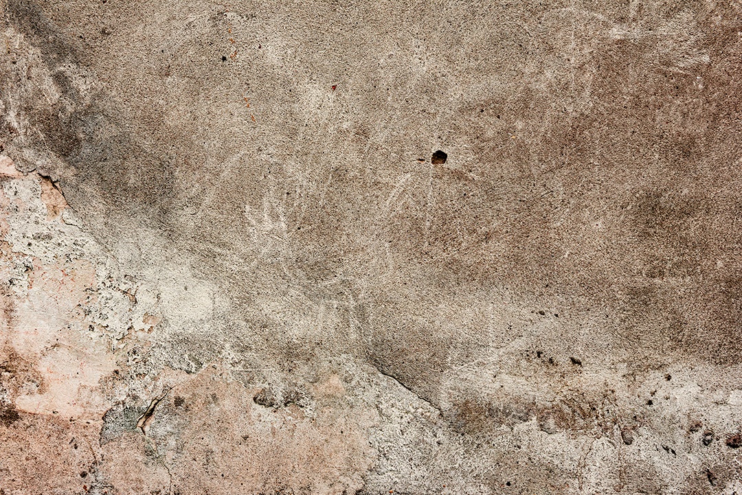 Textura, parede, concreto, pode ser usado como fundo. Fragmento de parede com arranhões e rachaduras