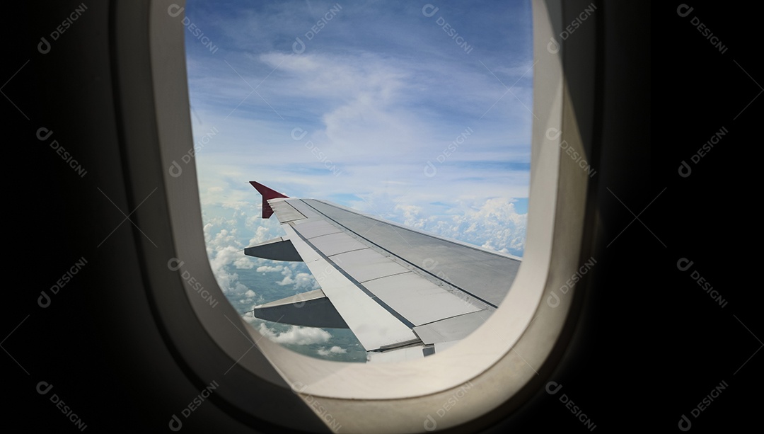 Janela com vista para asa do avião