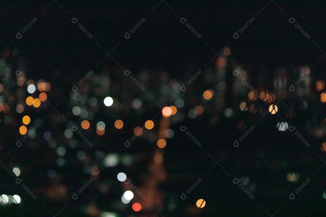 Fundo desfocado de uma cidade com luz noturna