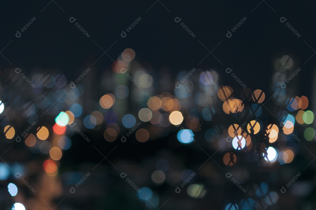 Fundo de uma cidade desfocada a noite