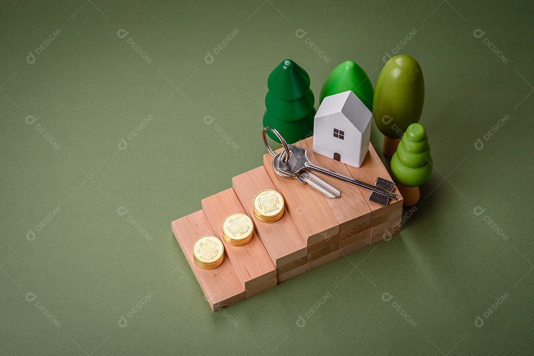 Uma casinha de madeira e chaves como ideia para investir na casa própria e atingir o objetivo de comprar um imóvel. Plano de fundo para sua ideia
