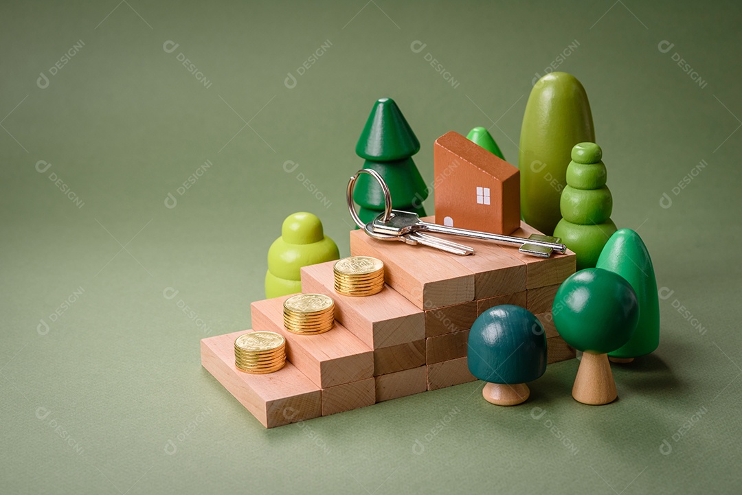 Uma casinha de madeira e chaves como ideia para investir na casa própria e atingir o objetivo de comprar um imóvel. Plano de fundo para sua ideia