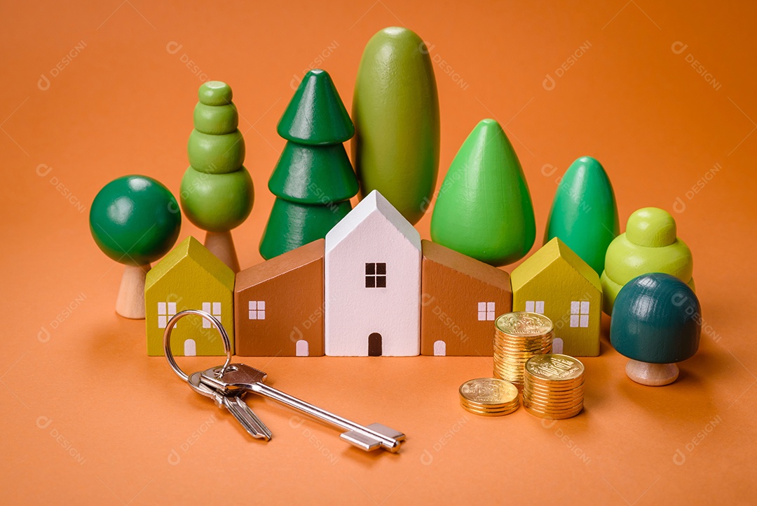 Uma casinha de madeira e chaves como ideia para investir na casa própria e atingir o objetivo de comprar um imóvel. Plano de fundo para sua ideia