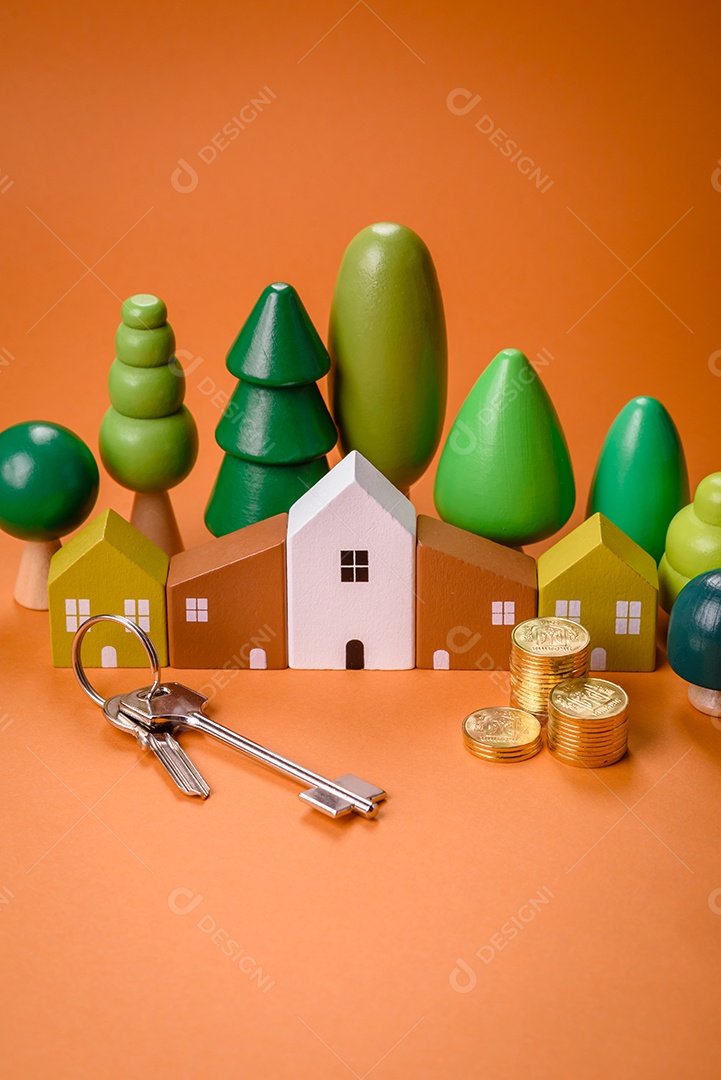 Uma casinha de madeira e chaves como ideia para investir na casa própria e atingir o objetivo de comprar um imóvel. Plano de fundo para sua ideia
